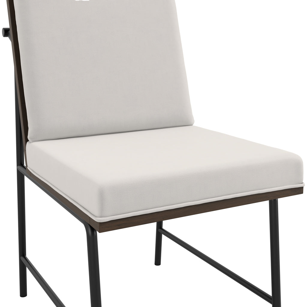 Chair with white cushion and dark metal frame on a white background Harry Christian Home White Dining Chair With Wooden FrameworkAnd Black Legs Seat Close Up
