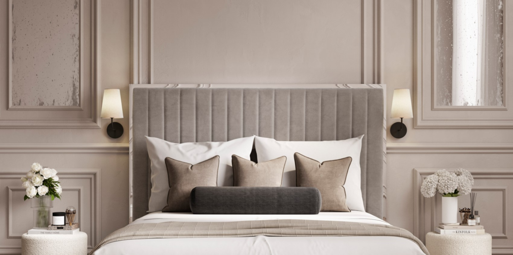 Gray upholstered bed in a stylish bedroom with matching nightstands and decor.