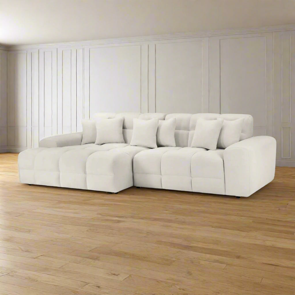 Beige sectional sofa on a white background